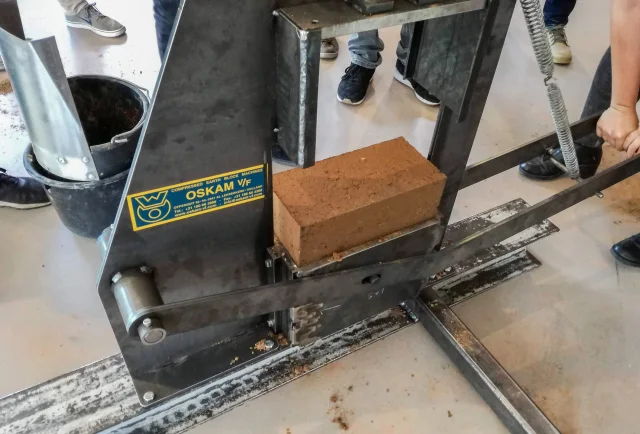 Students develop handpress for earthblocks
